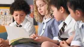 Schoolchildren reading.
