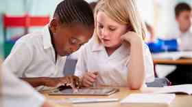 Schoolchildren using iPad