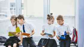 School children with notebooks