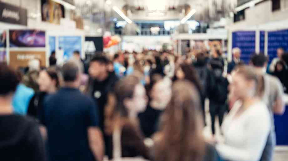 Busy crowd at an indoor event