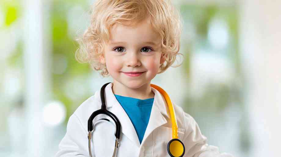 Child dressed as doctor.