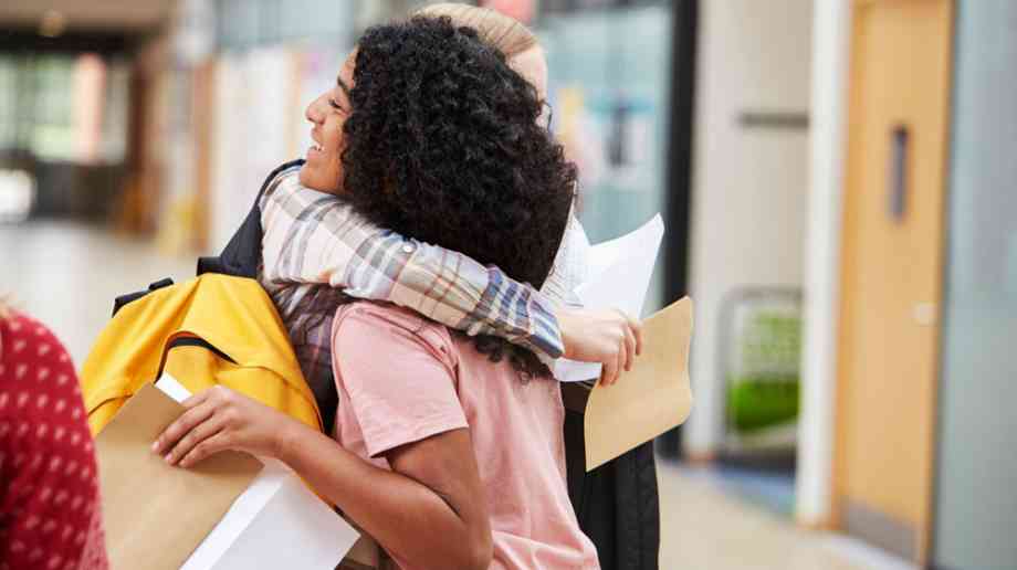Two girls celebrating results