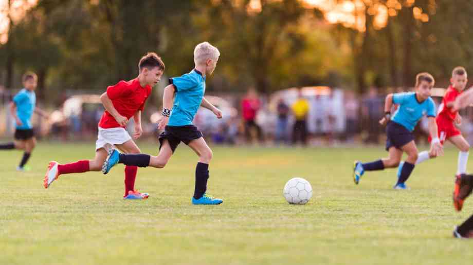 Kids playing football