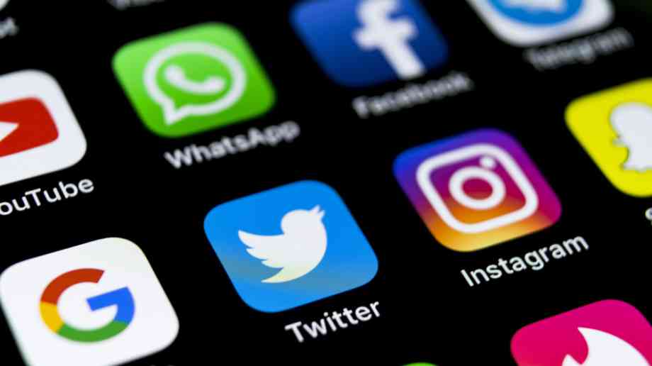 Close up of a phone screen. Multiple app icons are in shot, including Instrgram, Whatsapp and Google.