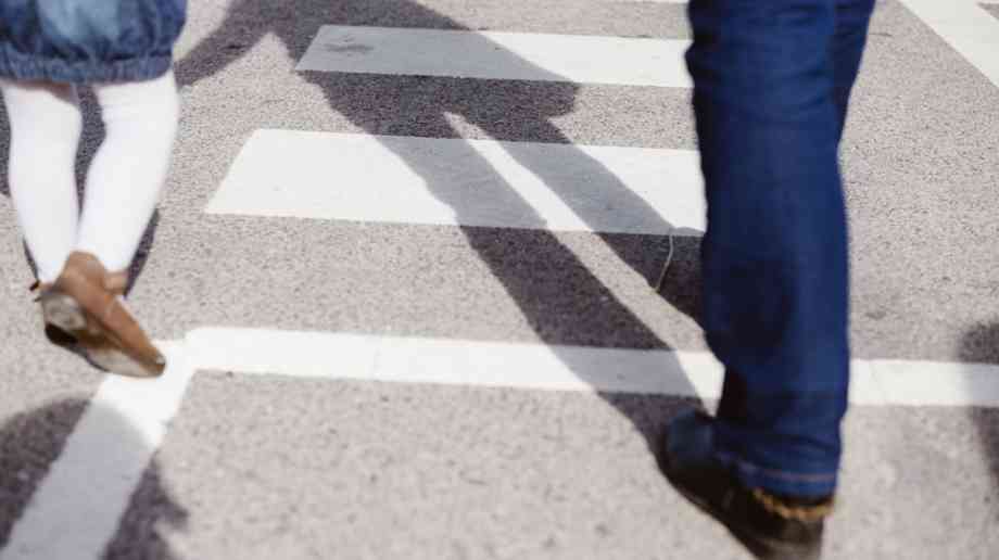 Child and parent walking