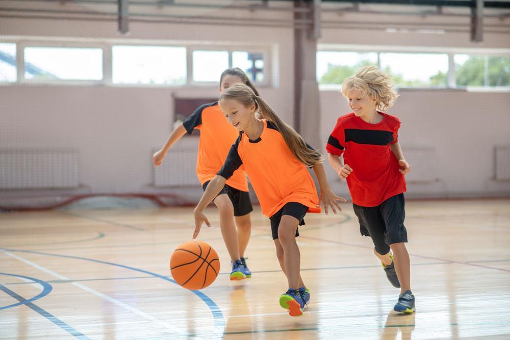 Children playing basketball