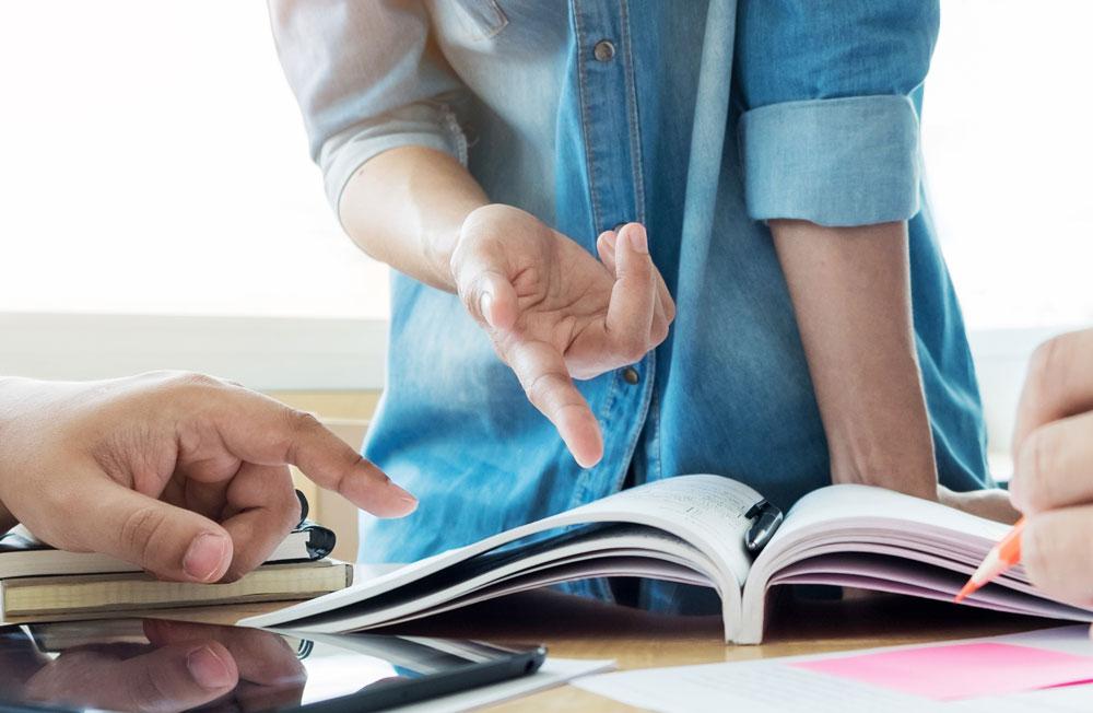 Teacher with book
